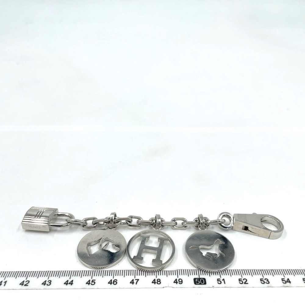 Authentic Hermes Palladium Breloque Olga Bag Charm in Silver